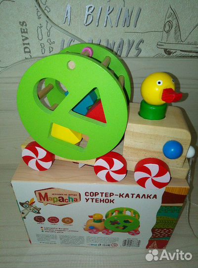 Развивающая игрушка-каталка сортер Утёнок