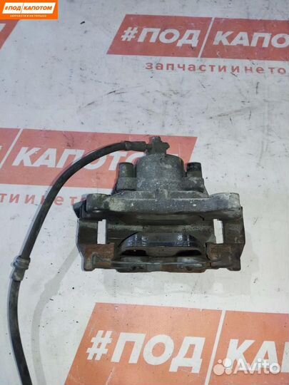 Суппорт тормозной передний левый Volkswagen Tiguan