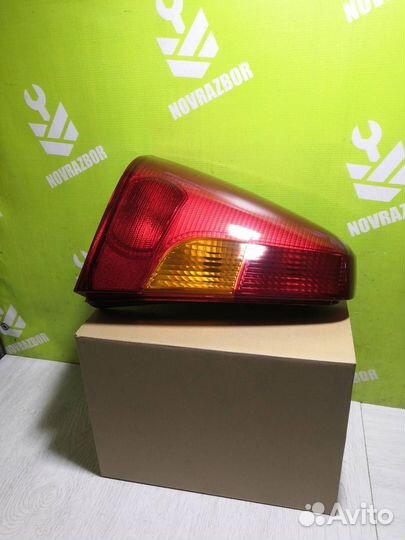 Фонарь задний левый Рено Логан