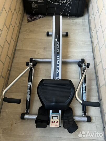 Гребной тренажер