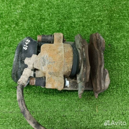 Суппорт тормозной передний левый Skoda Fabia