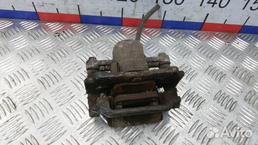 Суппорт тормозной задний левый toyota corolla vers