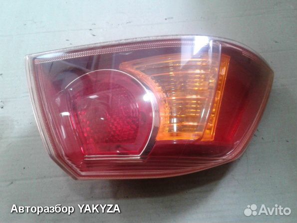 Левый фонарь фара в крыло Митсубиси Лансер 10