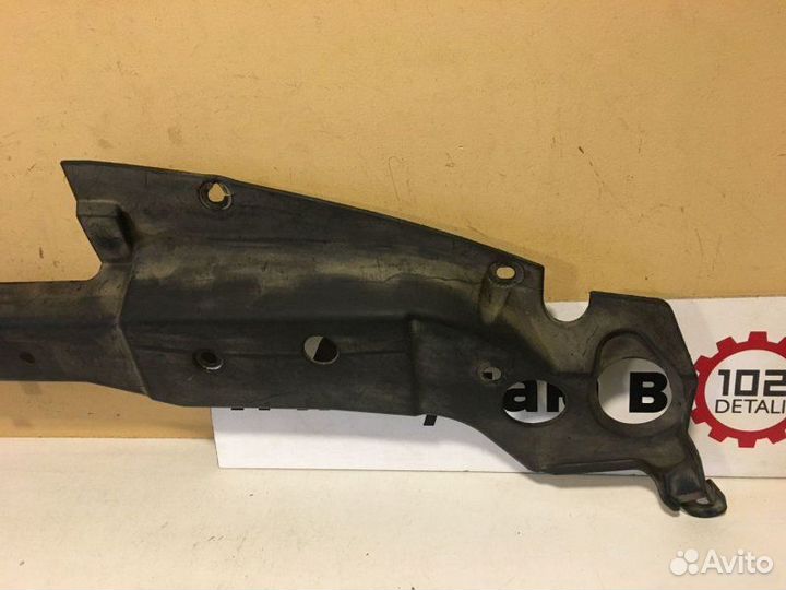 Кожух замка капота Nissan Tiida C11