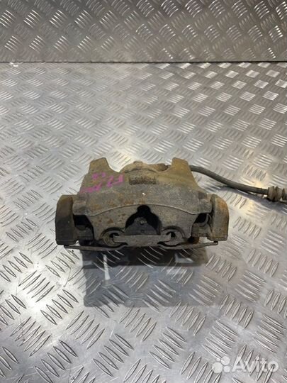 Суппорт тормозной передний левый Ford Mondeo 4 1.6