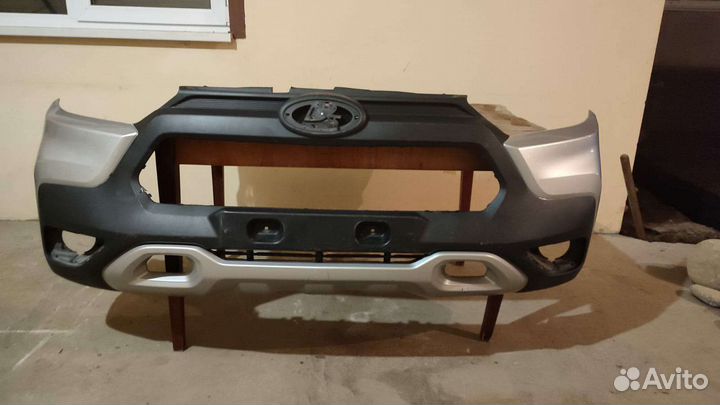 Передний бампер на ниву тревал