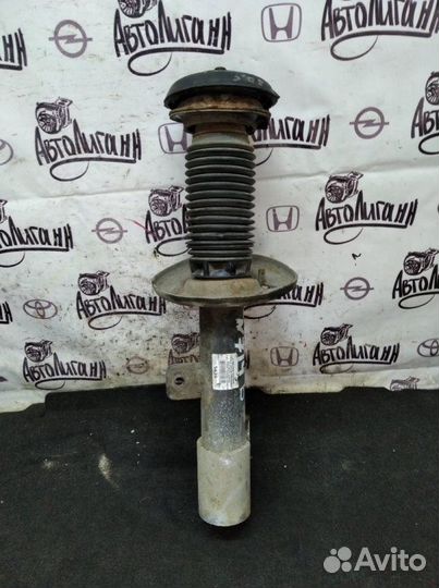 Амортизатор передний левый Peugeot 308