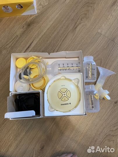Молокоотсос medela электрический