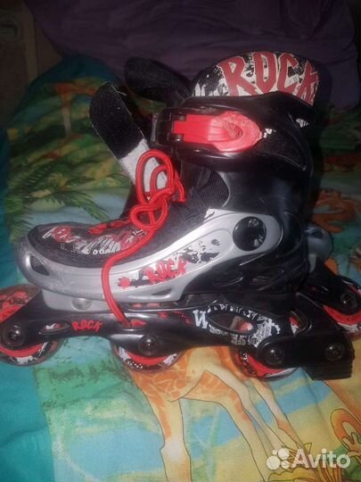 Коньки роликовые