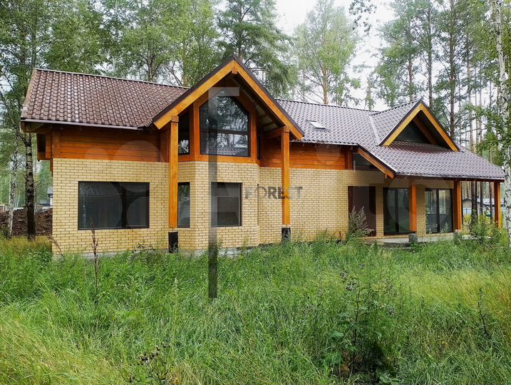 Коттедж 250 м² на участке 8 сот.