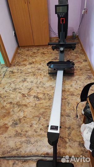 Гребной тренажер