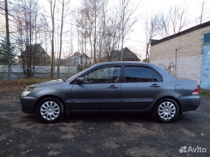 Mitsubishi Lancer 1.6 МТ, 2005, 195 000 км