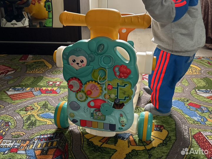 Развивающий автомобиль ходунки каталка