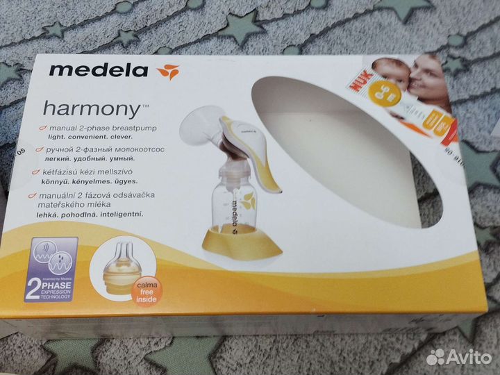 Молокоотсос medela