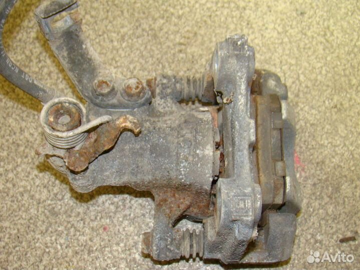 Суппорт задний левый Suzuki SX4