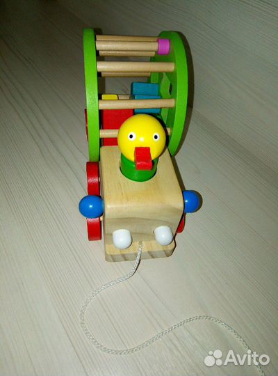Развивающая игрушка-каталка сортер Утёнок