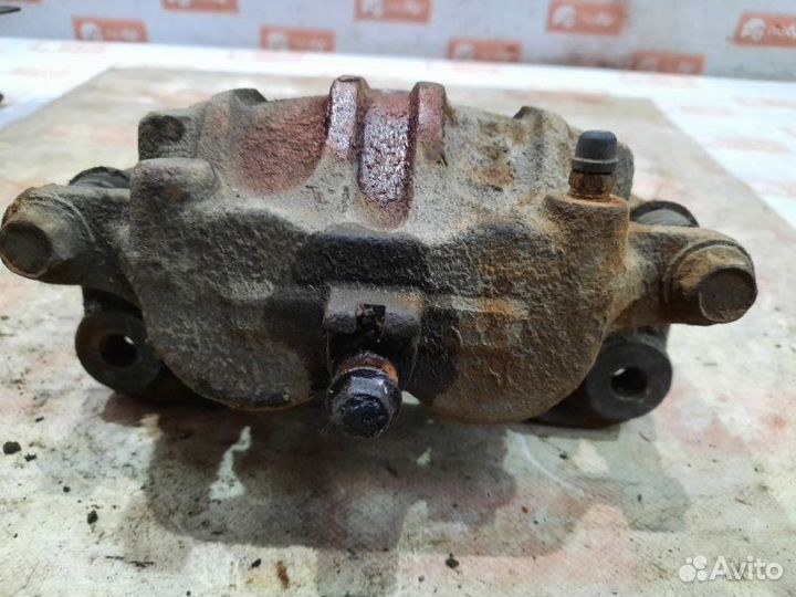 Суппорт передний левый Nissan Patrol Y61 RD28TI