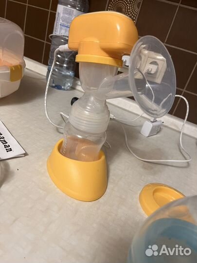 Электрический молокоотсос maman и стерилизатор