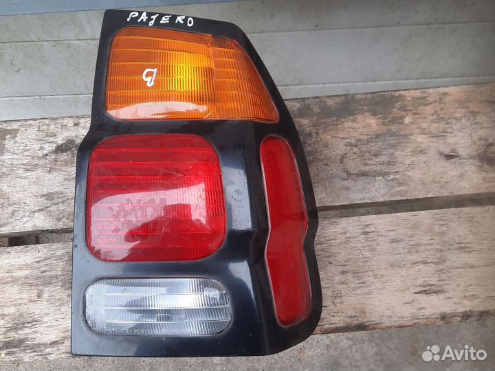 Фонарь задний паджеро спорт