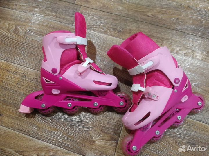 Коньки роликовые