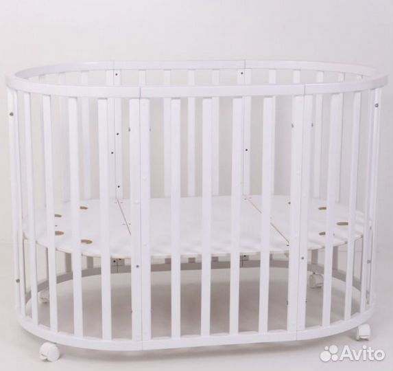 Детская кроватка с маятником