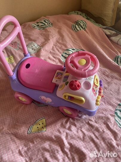 Машинка-каталка музыкальная