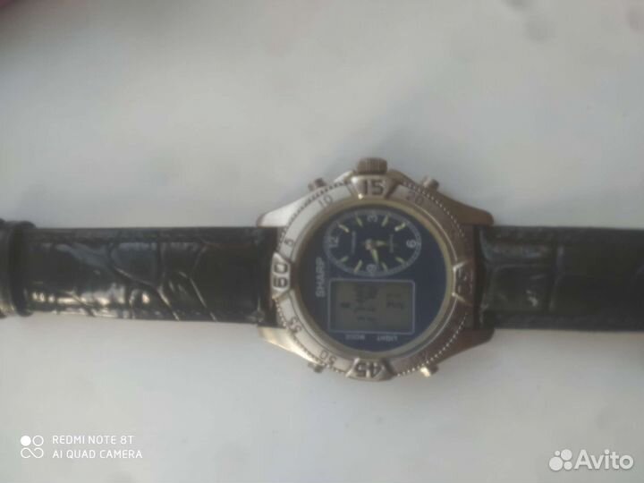 Часы sharp