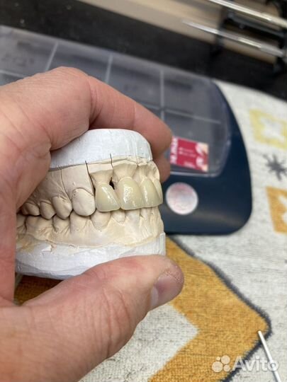 Зубной техник