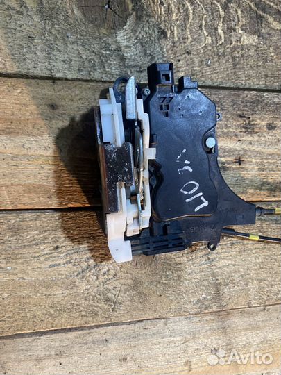 Замок задний левый mitsubishi lancer 10