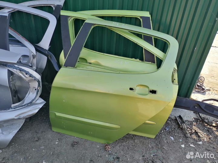 Дверь левая Peugeot 308