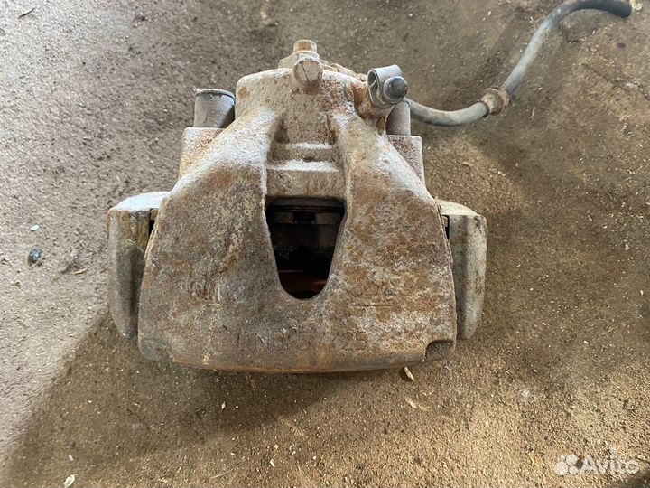 Суппорт передний левый Opel Astra H