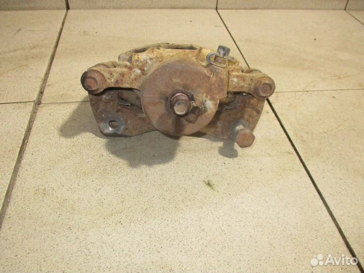 Суппорт передний правый Chevrolet Lacetti