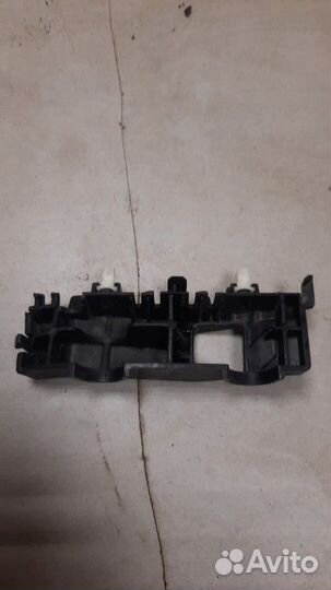 Кронштейн переднего бампера правый Hyundai Tucson