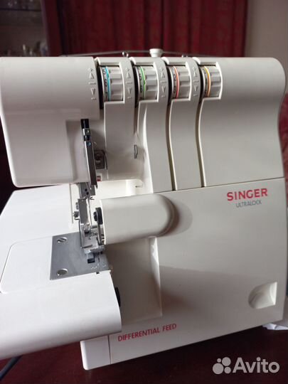 Коверлок зингер