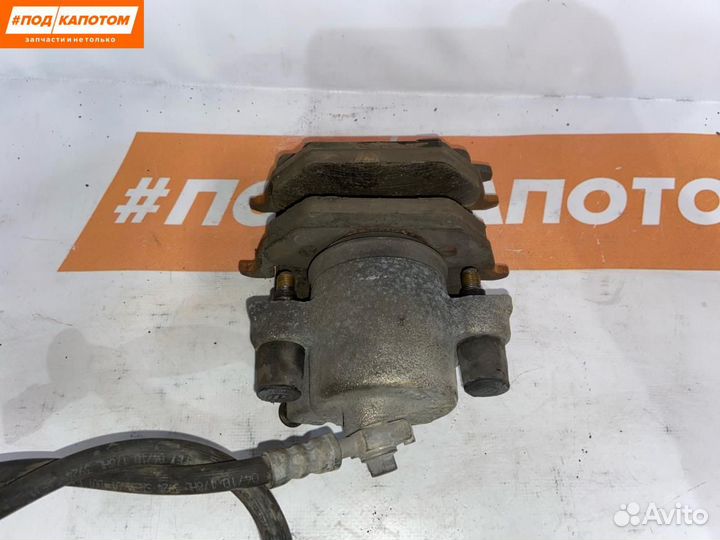 Суппорт тормозной передний правый Volkswagen Polo