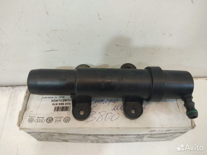 Форсунка омывателя фары передняя Skoda Superb 2