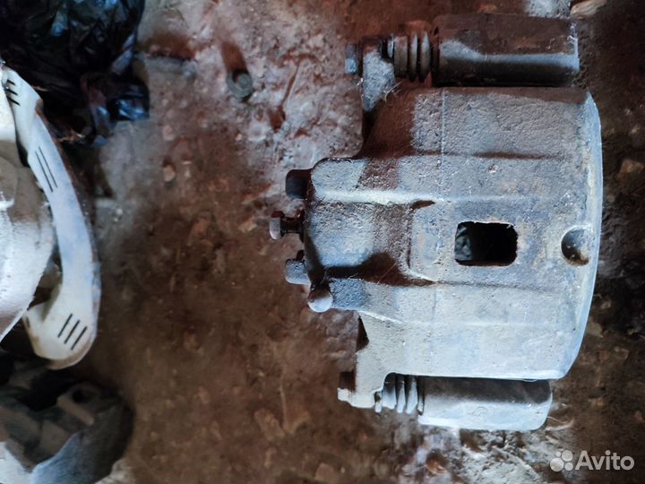 Mitsubishi galant 9 суппорт тормозной задний левый