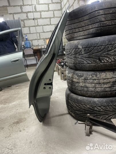 Дверь задняя левая Nissan Almera Classik