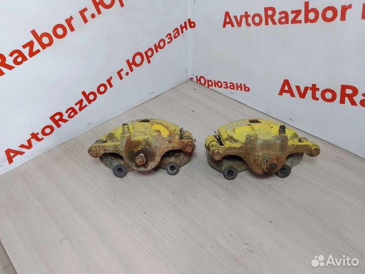 Суппорт передний Nissan Sunny N16