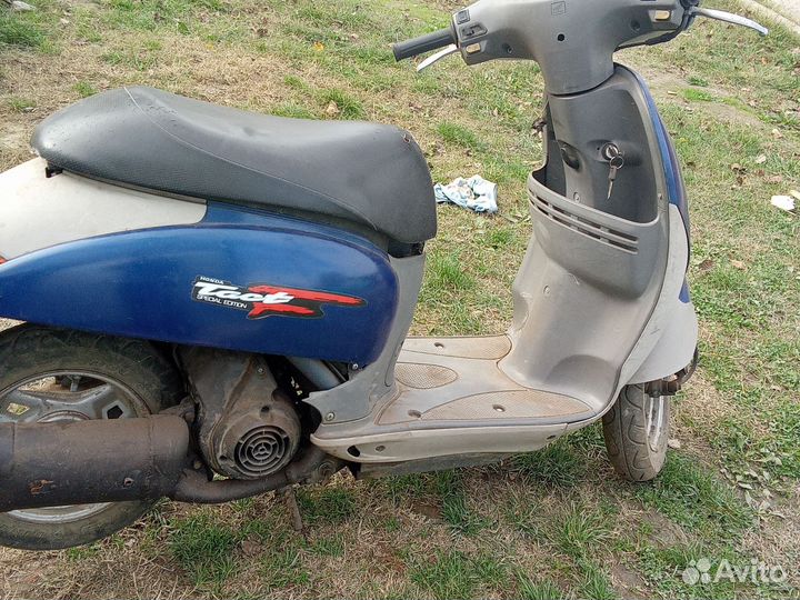 Скутер honda tact