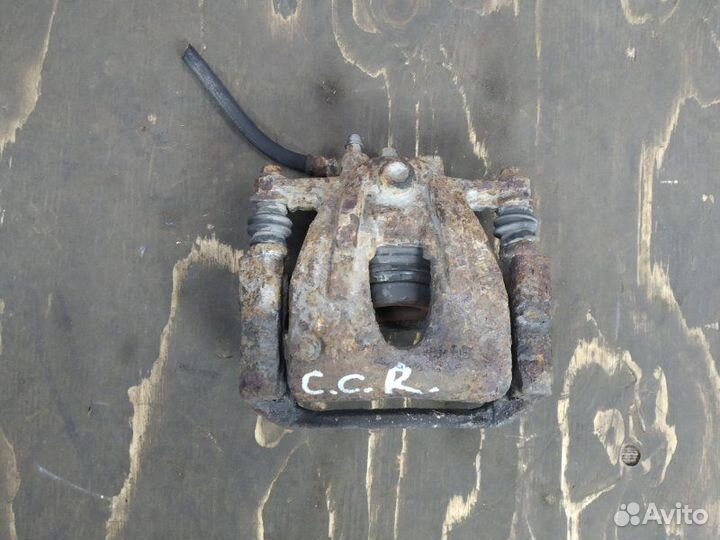 Тормозной суппорт передний правый Opel Corsa C