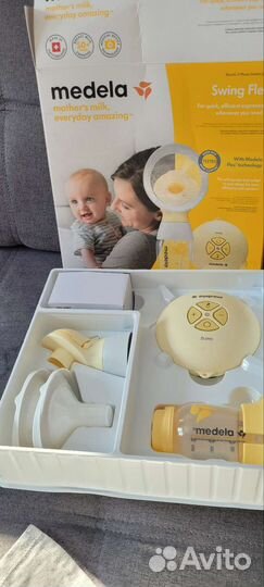 Молокоотсос medela электрический