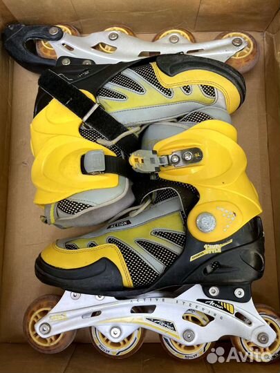 Роликовые коньки