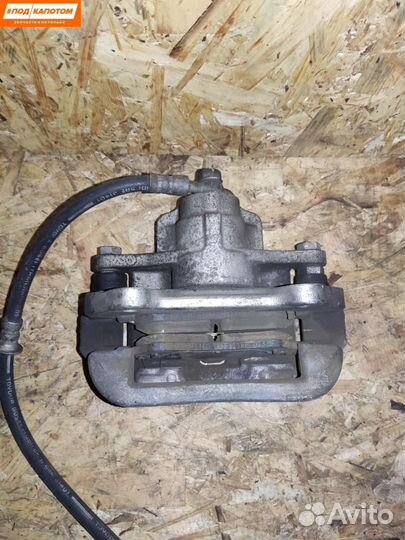 Суппорт тормозной задний правый Toyota Camry XV40