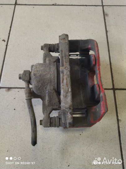 Суппорт тормозной передний левый Chevrolet Cruze