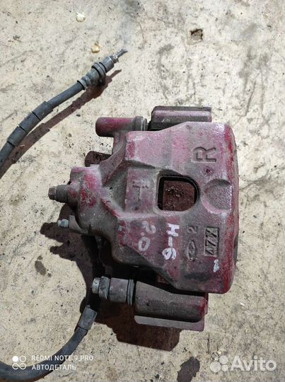 Передний правый суппорт мазда 6 gg 1.8