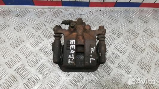 Суппорт тормозной задний левый nissan X-trail T31