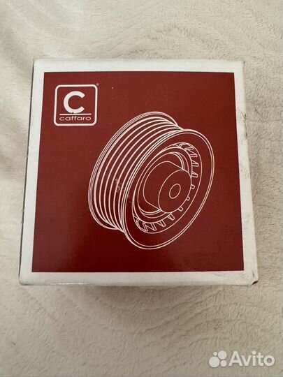 Ролик натяжителя ремня