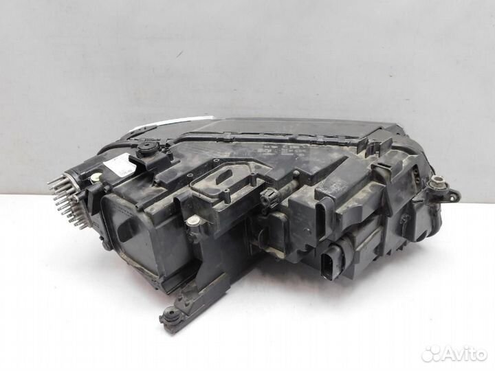 Фара левая Volkswagen Tiguan