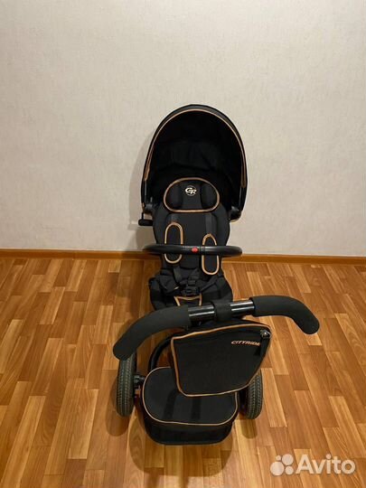 Велосипед-коляска с родительской ручкой